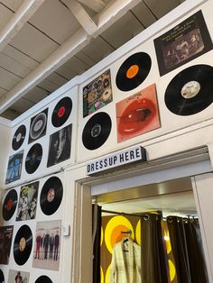 there are many records on the wall