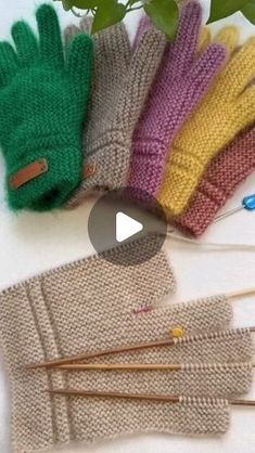 knitted gloves and knitting needles on a table