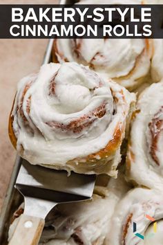 there are many cinnamon rolls on the table