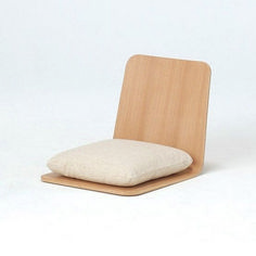 a wooden chair with a white cushion on it