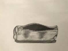 a pencil drawing of a purse on a white paper