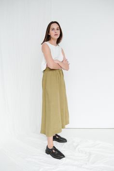 "SIZING & FIT This skirt is loose. Before placing an order, check the approximate measurements of the finished garment given below. Model is 5′6″ (170cm) tall with an 80cm/31″ bust, 68cm/26″ waist, 91cm/35″ hip, and she is wearing an XS in olive. XS Length ± 95cm | 37.4\" Unstretched waist ± 60cm | 23.6\" Hips ± 130cm | 51.2\" Hem width ± 178cm | 70.1\" S-M Length ± 95cm | 37.4\" Unstretched waist ± 68cm | 26.8\" Hips ± 138cm | 54.3\" Hem width ± 186cm | 73.2\" L-XL Length ± 95cm | 37.4\" Un Maxi Linen Skirt, Long Linen Skirt, Olive Skirt, Skirt Linen, Skirt A Line, Nice Handwriting, Womens Skirts, Skirt Maxi, Skirt Long