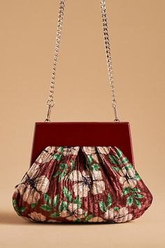 Polyester, elastane; cotton lining Removable crossbody chain strap Frame closure Imported | Pleated Velvet Clutch by Anthropologie in Pink, Women's, Polyester/Cotton/Elastane Luxury Velvet Clutch For Formal Occasions, Luxury Velvet Party Clutch, Elegant Handmade Velvet Clutch, Luxury Velvet Clutch, Elegant Embroidered Pink Clutch, Velvet Clutch, 50 Fashion, Chain Strap, Anthropologie