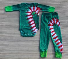 a baby's green and red tie dye outfit