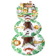 three tiered plate with jungle animals and trees on the top, in front of a white background