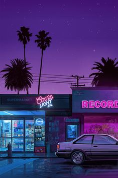 a car is parked in front of a record shop at night with palm trees behind it