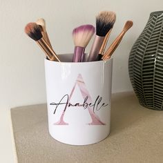 This beautiful personalised pink marble make up brush holder make the perfect gift. It can be used as a pencil or pen pot, a make up brush holder or to keep anything else you want safe! This mug is printed to the highest standard & every order is printed and dispatched in the UK. Size: 11oz Details: Ceramic pot Print: Single sided print Colour: White Dishwasher Safe White Dishwasher, Wedding Cushion, Pen Pot, Flower Makeup, Mug Holder, Makeup Brush Holder, Personalised Pens, Make Up Brush, Marble Decor