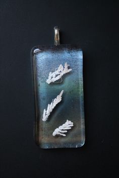 Did you know? These pendants have REAL leaves fused inside them! The white leaves you see, is the ash burnout of a real plant that I placed between 2 pieces of glass. The plant will now live forever in a glass pendant.  * * #glassart #oneofakind #glassjewelry #leafpendants #ashburnout #glassnecklace #glasspendant #fusedglass #glassfusedpendant #functionalart #wearableart #handmadeglass #mixedmediaart #uniquefusedpendant #kilnworkedpendant #etsyjewelry #etsypendant #etsyartist #megnificentstudios