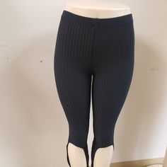 Black Stretch Leggings With Foot Straps New With Out Tag True To Size Mannequin Has On A Small Material Is Polyester And Spandex And Cotton Casual Ribbed Stretch Tights, Casual Ribbed Elastane Leggings, Trendy Black Footless Bottoms, Black Elastic Footless Bottoms, Stretch Ribbed Black Pants, Black Stretch Ribbed Pants, Trendy Black Ankle-length Leggings, Casual Stretch High-cut Leggings, Black Ribbed Bottoms For Spring