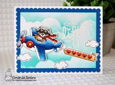 a card with a raccoon flying in an airplane