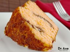 a piece of cake sitting on top of a white plate with a fork next to it