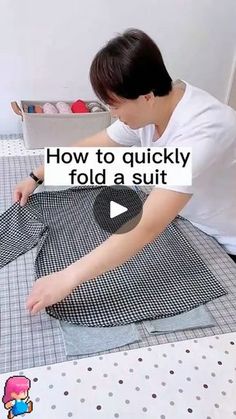 a woman is making clothes on a table with the words how to quickly fold a suit