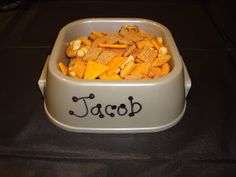 a bowl filled with cheetos and peanuts that says tacop on it