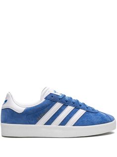 blue/white leather signature 3-Stripes logo contrasting heel counter round toe front lace-up fastening branded insole rubber sole These styles are supplied by a premium sneaker marketplace. Stocking only the most sought-after footwear, they source and curate some of the most hard to find sneakers from around the world. Blue Skate Shoes With Three Stripes And Round Toe, Blue Three Stripes Skate Shoes With Round Toe, Blue Streetwear Sneakers With Three Stripes, Blue Low-top Sneakers With Three Stripes, Adidas Custom Lace-up Sneakers With Three Stripes, Blue Leather Sneakers With Three Stripes, Blue Sneakers With Three Stripes Branding, Blue Low-top Sneakers With Three Stripes Branding, Blue Adidas Sneakers With Vulcanized Sole