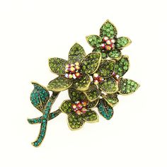 "Gorgeous green crystal flowers brooch, which can be used for your DIY project - Winter wedding, bridal bouquet, ring pillow, invitations, garter, cake and frame decorations, event, event decor, crafts, scrap booking and much more. Perfect for your winter wedding! Size: 2 3/4\"H x 1 1/2\"W Metal: Gold plated Please note that this rhinestone floral bouquet broach embellishment has flat backing but if you prefer to have it with pin so you can use it as a brooch, please add a note during the check Bouquet Ring, Bouquet Brooch, Crystal Flowers, Brooch Bouquets, Ring Pillow, Dress Hat, Hat Pin, Brooch Jewelry, Crystal Brooch