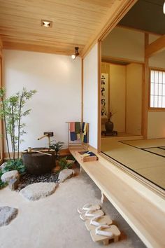 the interior of a japanese house with wood trimming