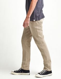 RSQ Slim Chinos. Formerly known as the "London Skinny Chino Pants". Skinny straight leg. Slant front pockets with welt back pockets. Zip fly. Button waist. 97% cotton/3% spandex. Machine wash. Imported. Casual Fitted Straight Work Pants, Fitted Bottoms For Business Casual, Casual Mid-rise Chinos With Belt Loops, Trendy Pants With Belt Loops And Straight Hem, Fitted Casual Work Pants, Casual Bottoms With Straight Hem For Fall, Casual Fitted Pants With Straight Hem, Trendy Business Casual Bottoms With Button Closure, Fitted Pants With Straight Hem Casual Style