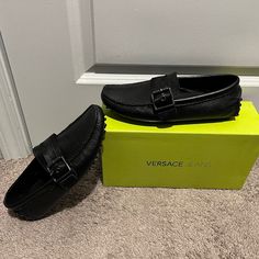 Versace Jeans Loafers New With The Box. Size 8. Black. Luxury Black Slip-on Moccasins, Designer Black Loafers With Round Toe, Designer Black Moccasins With Rubber Sole, Designer Round Toe Moccasins For Business Casual, Designer Moccasins With Round Toe For Business Casual, Luxury Black Moccasins, Designer Black Moccasins With Leather Sole, Luxury Black Flat Loafers, Designer Black Loafers With Textured Sole