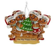 a christmas ornament with three gingerbreads on it