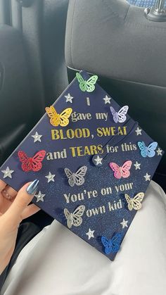 someone is holding up a graduation cap that says, i save my blood, sweat and tears for this you're on your own kid