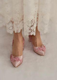 Planning a Parisian wedding? These romantic dusty pink satin wedding shoes complete your look beautifully. Crafted from soft dusty pink satin and embellished with floral lace appliques, these bridal shoes will make sure you feel like a princess! Not only are they fairy tale shoes, but also comfortable thanks to theier block heels and padded insoles... #dustypinkshoes #parisianwedding #weddingshoes #blockheels #bridalshoes #laceshoes #satinshoes Pink Wedding Shoes Brides, Embellished Lace High Heels, Pink Pointed Toe Wedding Shoes, Pink Closed Toe Wedding Shoes, Pink Embellished Evening Wedding Shoes, Pink Embellished Wedding Shoes For Evening, Pink Closed Toe Evening Wedding Shoes, Evening Wedding Shoes Pink Embellished, Pink Closed Toe Wedding Shoes For Evening