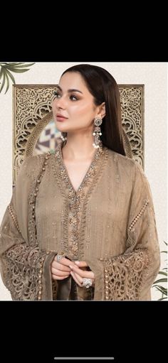 Top- Heavy georgette embroidered. Dupatta - Net embroidered with bordered patches. Bottom - Santoon with embroidered payal bunches Hania Amir Dresses, Black Abaya Designs, Pakistani Suit, Pakistani Designer Suits, Fashion Sewing Tutorials, Chiffon Collection, Maria B, Pure Chiffon, Embroidered Dupatta