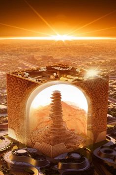 an aerial view of a building in the middle of a desert with sun shining over it