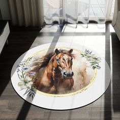 a brown horse standing on top of a white rug