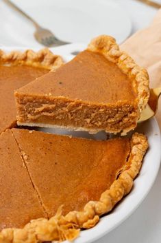 a slice of pumpkin pie on a plate