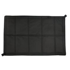 a black place mat with squares on it