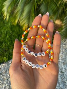 "Custom made orange, yellow, white and gold with white letter beaded bracelet set for you and your bearded dragon!  Different variations (such as color change, etc.) can be made upon request! Human bracelet standard size is 7\" Beardie bracelet standard size is 6 1/2\" Please let me know if either of these sizes needs to be adjusted. *Bracelet string is stretchy" Personalized Orange Beaded Bracelets As Gift, Orange Letter Beads Friendship Bracelets, Orange Beaded Friendship Bracelets With Letter Beads, Personalized Orange Bracelets With Round Beads, Personalized Orange Beaded Bracelets For Friendship, Personalized Orange Round Bead Jewelry, Orange Bracelet Ideas, Letter Bead Bracelets, Bracelet String