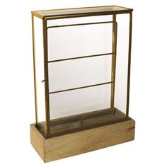 a wooden and glass display case on a white background