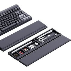 a computer keyboard and mouse in a black case