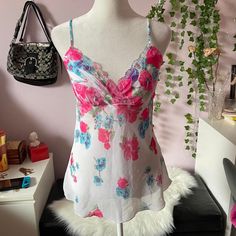 - Adorable vintage camisole top with a floral print - Sheer micro-mesh body and lined cups for coverage - Made in USA - Size medium Vintage Camisole, Outfit Design Ideas, Fairy Top, Pretty Fits, I'm Broke, Y2k Fairy, Outfit Design, Pink Floral Print, Y2k Outfits