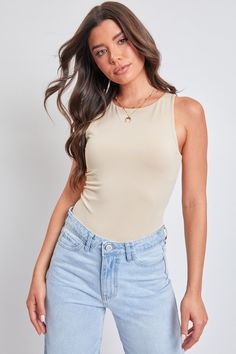 If looks could kill, you would literally slay in our Women’s Heart on My Sleeveless Bodysuit. Constructed with two layers of soft, stretchy fabric for a comfortable and flattering figure-hugging silhouette. Detailed with a high crew neckline and a racer back. Finishes with a thong bottom and two snap button closures. Style with your favorite YMI jeans and heeled sandals for a classy ‘fit worthy of both daytime and date nights. Product Details- Sleeveless - High Crewneck - Lined- Thong Bottom wit Sleeveless Beige Bodysuit With Built-in Bra, Trendy Stretch Bodysuit With Seamless Construction, Trendy Stretch Seamless Bodysuit, Beige Sleeveless Bodysuit With Built-in Bra, Chic Stretch Bodysuit For Layering, Sleeveless Elastane Bodysuit With Built-in Bra, Sleeveless Beige Lined Bodysuit, Seamless Stretch Tank Bodysuit, Beige Sleeveless Lined Bodysuit