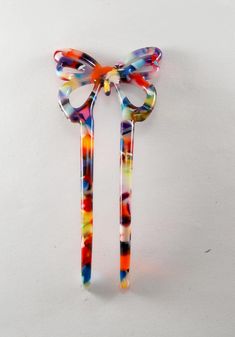 For sale is a colorful butterfly Hair fork. The hair fork  measures  1 3/4" x 4 1/2". The hair fork is plastic.  New Treasures added all the time. Check back often! Hair Fork, Colorful Butterfly, Butterfly Hair, Colorful Butterflies, Wedding Basket, Hair Accessory, Hair Pins, Beauty Book, Hair Accessories