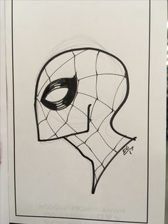 a drawing of a spider man's face in black and white ink on paper