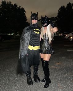 two people dressed up as batman and catwoman