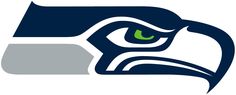 the seattle football logo is shown on a blurry blue and white background with green eyes