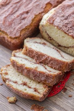 sliced loaf of bread sitting on top of a red plate