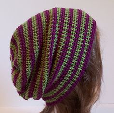 a woman's head wearing a knitted hat