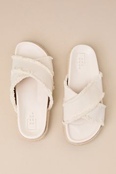 Compliments are guaranteed when you pair any of your favorite summer looks with the Shu Shop Courtney Bone Flatform Slide Sandals! These too-cute sandals feature an almond-shaped footbed and wide, frayed fabric straps that crisscross atop a peep-toe upper. The espadrille-wrapped flatform sole lends an extra-summery finish to the look, while the simple slide-on contoured design makes for easy styling! 0. 75" espadrille-wrapped sole. Smooth insole. Felted rubber sole has nonskid markings. Man Made Frayed Fabric, Resort Wear Beach, Almond Shaped, Cute Sandals, Spring Shoes, Women's Summer Fashion, Resort Wear, Slide Sandals, Summer Looks