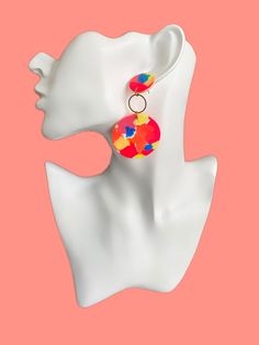 "Super fun  and colorful  statement earrings. The will definitely make your outfit pop  Handmade with polymer clay *They are completely handmade meaning you are going to have a unique piece of jewelry, they're also very lightweight and comfortable to wear. ・Dimensions (inches) 2.7\"approx. ・Details Colors: yellow, pink, orange and blue. Hypoallergenic (Surgical stainless-steel posts) ・Care Information *Store your jewelry in a dry place away from direct sunlight. Do not wear polymer clay jewelry while swimming, bathing or showering also avoid contact with lotions, hairsprays, perfumes etc. *Polymer clay is a strong and flexible material but should not be dropped or bent as this will lead to breaking or damage.  ・Packaging   Every order is beautifully gift wrapped and ready for giving or kee Playful Multicolor Resin Jewelry, Bold Handmade Multicolor Earrings, Colorful Fun Polymer Clay Jewelry, Bold Handmade Polymer Clay Earrings, Bold Handmade Colorful Earrings, Playful Orange Party Jewelry, Trendy Colorful Polymer Clay Jewelry, Bold Multicolor Summer Jewelry, Colorful Playful Summer Earrings