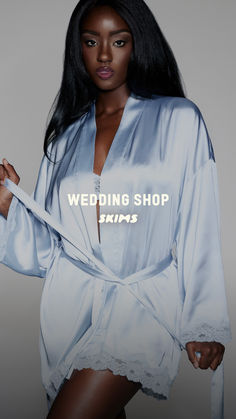 a woman is wearing a robe and posing for a magazine cover photo with the words wedding shop on it