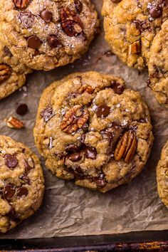 chocolate chip cookies are piled on top of each other