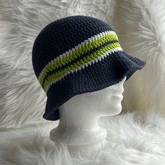 Cute Handmade Crochet Bucket Hat Done In Classic Seattle Seahawk Colors: Navy Body And Brim With A Contrast Band In White, Lime Green And Navy. Made With 100% Cotton Yarn That Is Breathable For Summer Wear. Adult Size, Compatible For Both Men And Women. Handmade, New And Never Worn. As A Handmade Item I Recommend Hand Wash, Lay Flat To Dry. Blue Knitted Beach Hat, Trendy Blue Brimmed Crochet Hat, Casual Wide Brim Blue Crochet Hat, Blue Yarn Hat With Short Brim, Adjustable Crochet Blue Bucket Hat, Blue Yarn Brimmed Bucket Hat, Blue Crochet Adjustable Bucket Hat, Adjustable Blue Crochet Bucket Hat, Blue Adjustable Crochet Hat With Short Brim