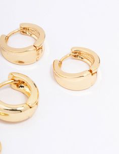 These huggie hoop earrings feature a timeless, classic design that can be worn with any outfit for a sophisticated yet understated look. This earring pack includes three pairs of gold plated earrings, perfect for styling in your everyday stack. Material: Gold Plated Dimensions: Length 13mm x Width 13mm Backing Type: Lever Back | Lovisa Gold Plated Basic Huggie Hoop Earring 3-Pack Earring Pack, Huggie Hoop Earrings, Gold Plated Earrings, 6 Packs, Timeless Classic, Classic Design, Gold Plate, Hoop Earrings, Plating