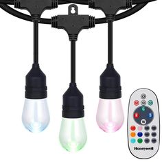 three light bulbs with remote controls attached to them