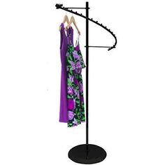 a coat rack with two coats hanging on it's sides and an umbrella stand