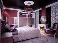 a bedroom with purple walls and white furniture